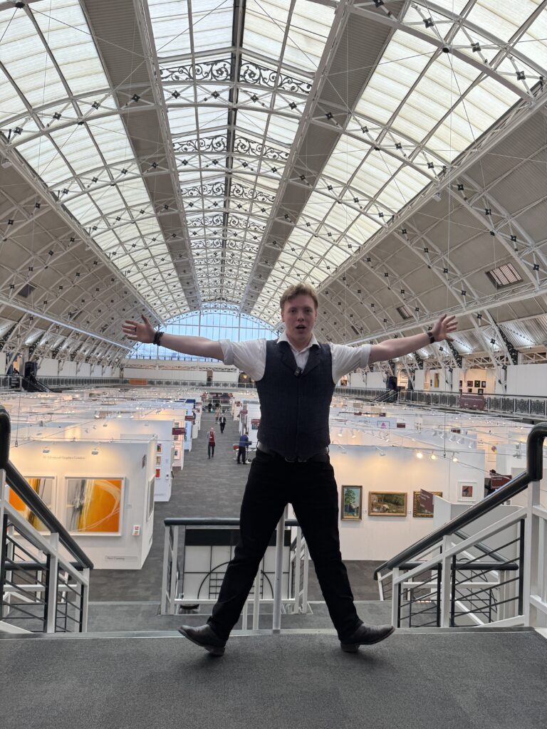 James Carter with arms outstretched at London Art Fair