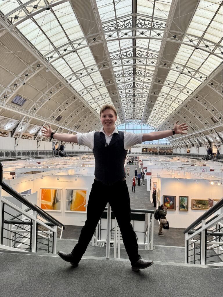 James Carter with arms outstretched at London Art Fair