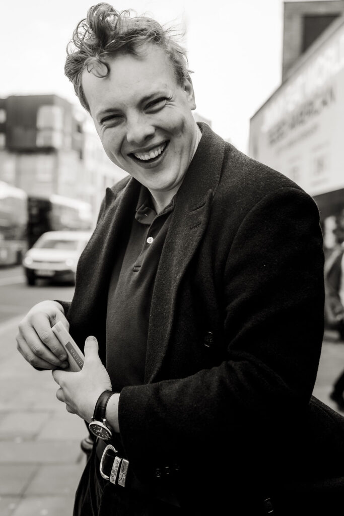 Black and white street portrait of James Carter in London