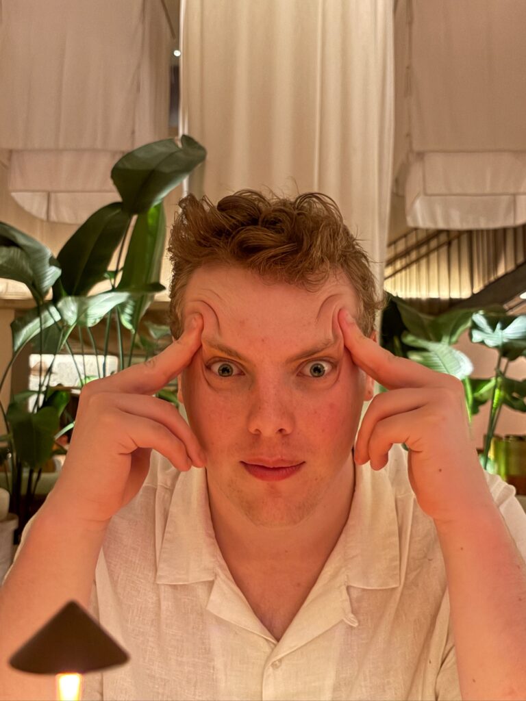 James Carter pulling a funny face at dinner in Miami