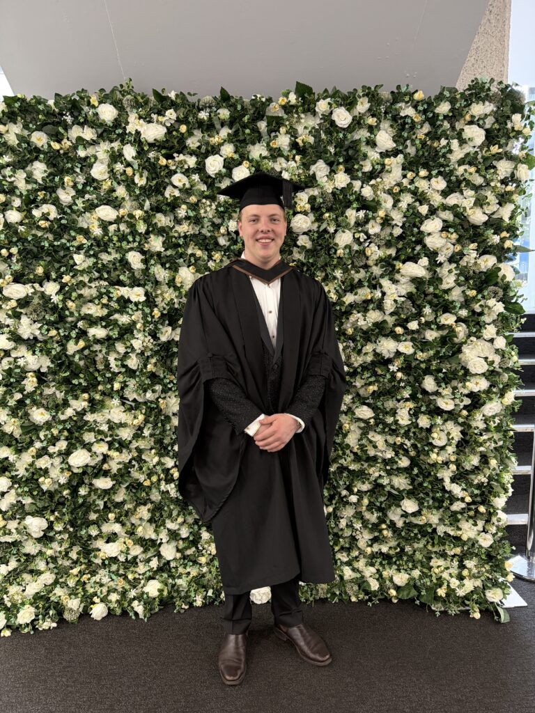 James Carter in his graduation gown after completing his BA at Goldsmiths, University of London