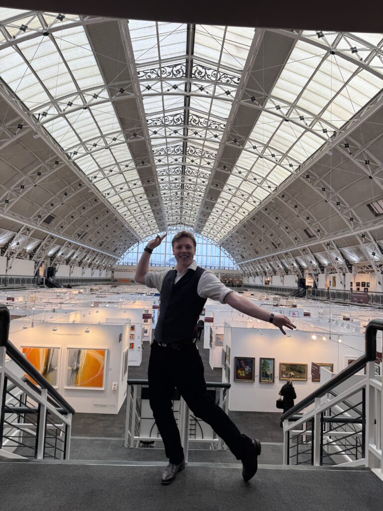 James Carter jumping on a balcony at London Art Fair