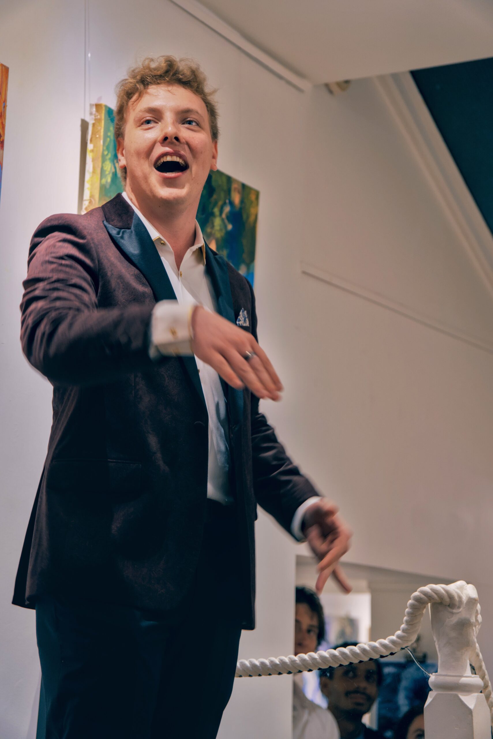 James Carter speaking to a room of artists at a London private view