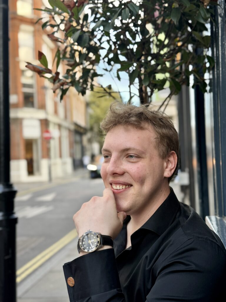 Portrait of James Carter smiling in Soho, London