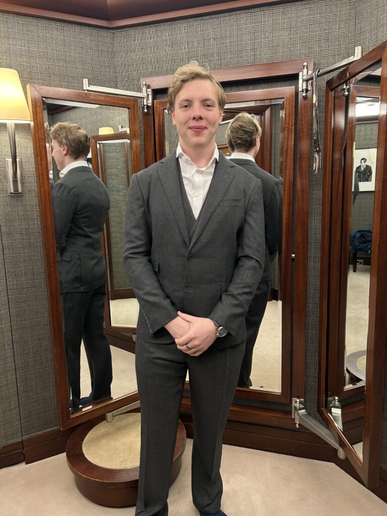 James Carter at a suit fitting with a Mayfair tailor