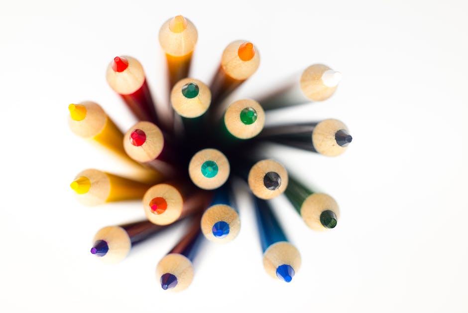 Image of artistic tools like paintbrushes, pencils, and a canvas, symbolizing the creative process and the intersection of art and philosophy.
